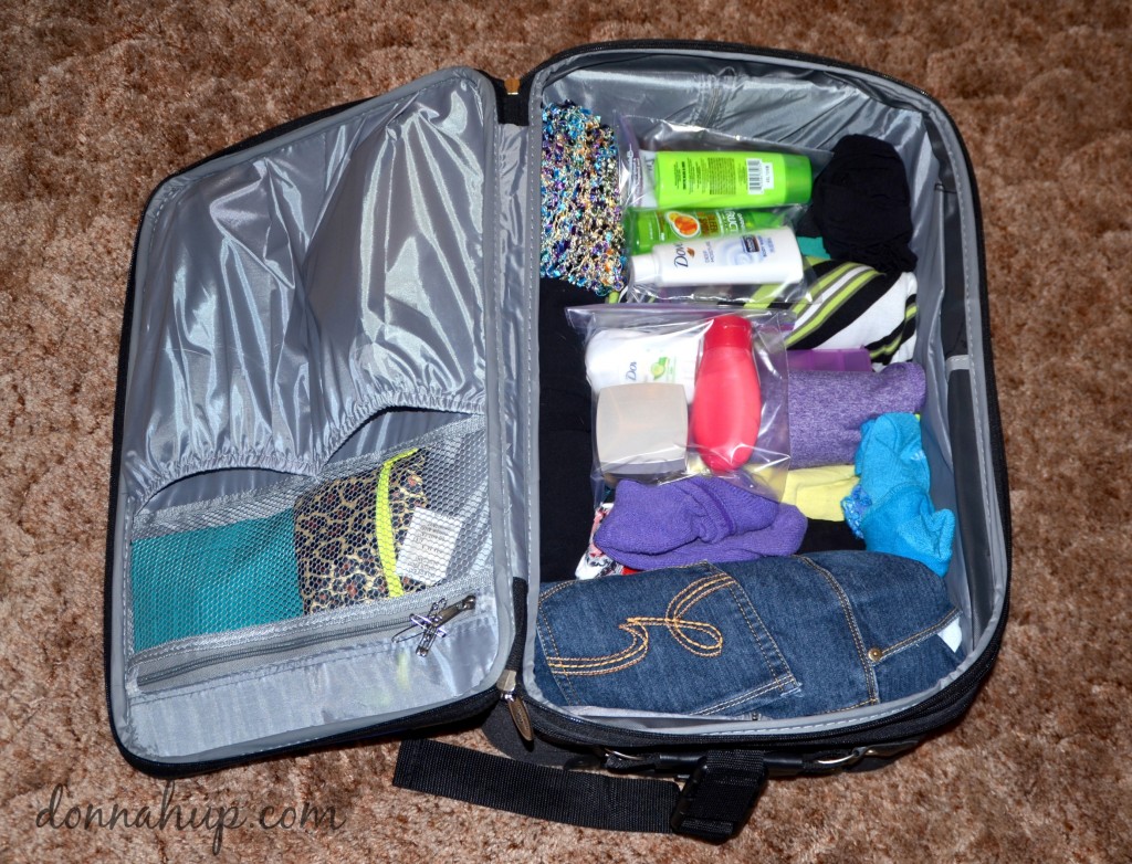 Neatly packed and organized carry on suitcase.