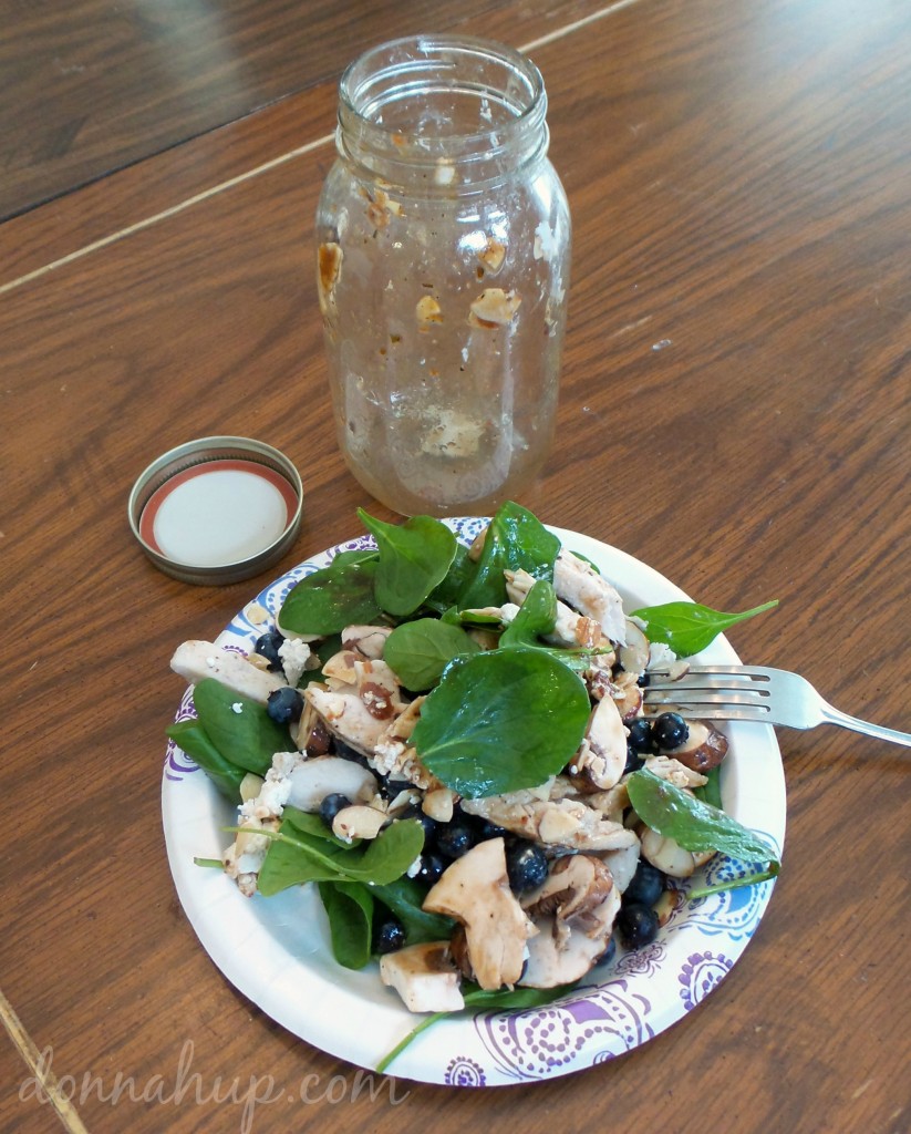 Salad from a jar poured out on a paper plate